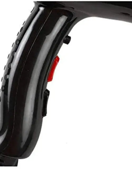 Close-up of a black tire with a red reflector on a white background