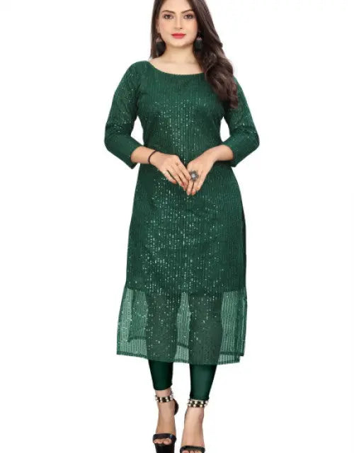 Woman wearing a green dress with a white background