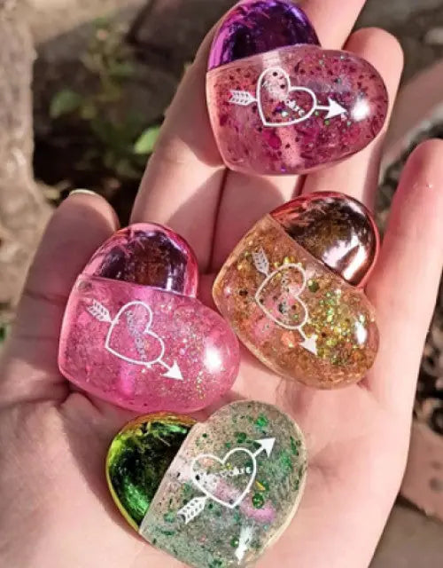 Heart-shaped mini lip gloss – transparent, shimmery, and non-sticky texture