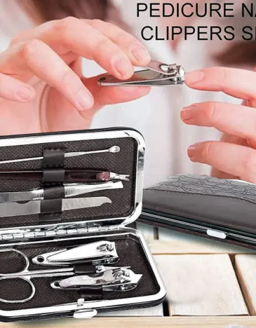 Manicure set with clippers and tools in an open case, held by hands.