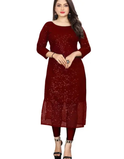 Woman wearing a maroon dress with a white background