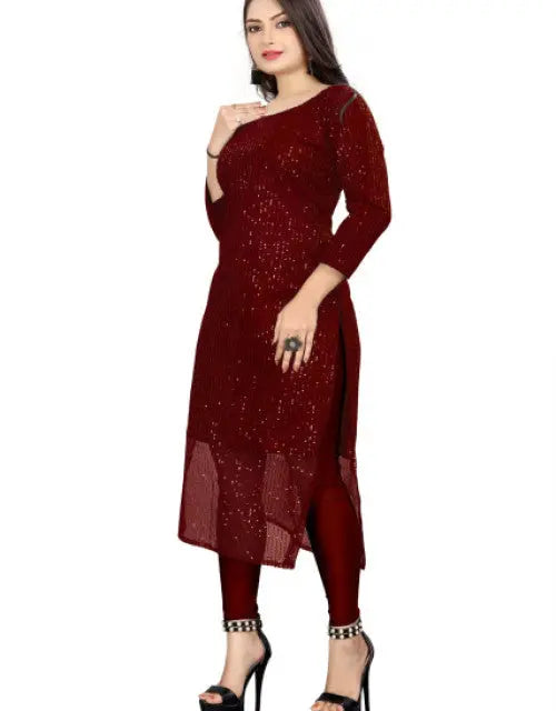 Woman wearing a maroon kurta with a white background