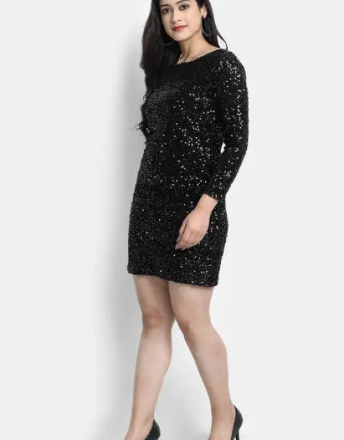 Black sequin dress worn by a model on a white background